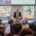 Professor David Kramer hält seine Antrittsvorlesung in den Räumlichkeiten der Internationalen Hochschule Liebenzell. Das Bild zeigt ihn an einem hellen Sommerabend vor einem großen, sitzenden Publikum im vollen Vortragssaal der IHL.